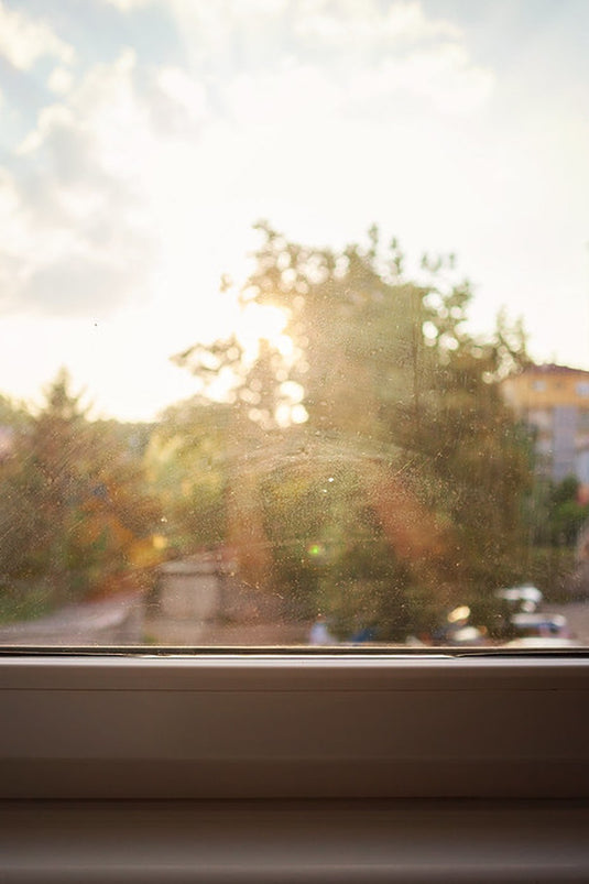 Soft morning light through a window as the fog lifts